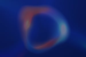 Fondo abstracto tecnológico con forma circular en degradados de azul, naranja y verde. Esta imagen se esta utilizando como fondo en el sitio web de Neracode.